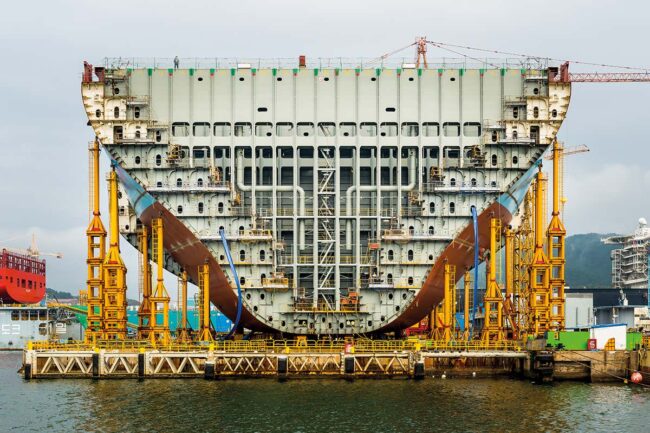 peer-into-a-giant,-half-formed-ship-that-can-hold-18,000-containers peer-into-a-giant,-half-formed-ship-that-can-hold-18,000-containers